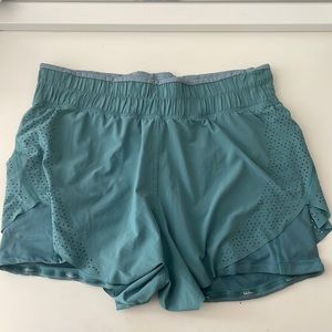 High waisted lululemon shorts with biker shorts underneath